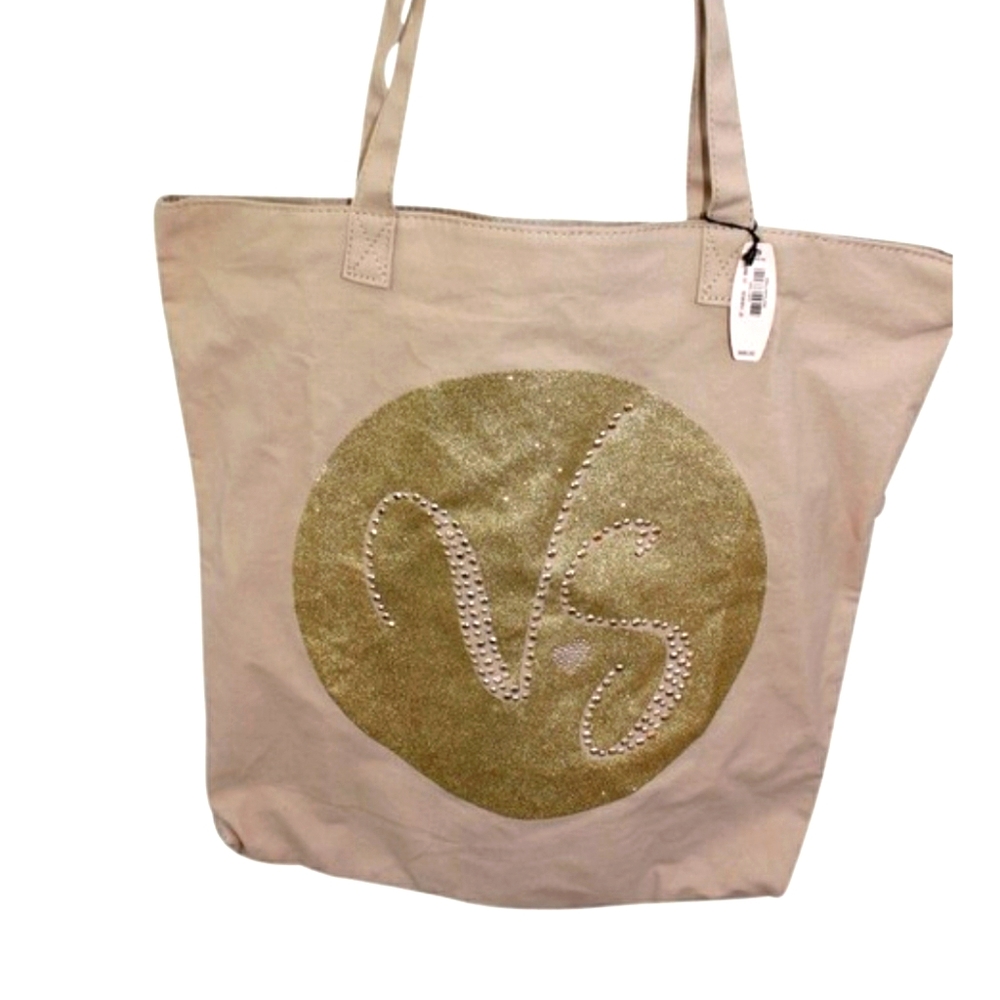 Victoria Secret Gold and Tan bag.